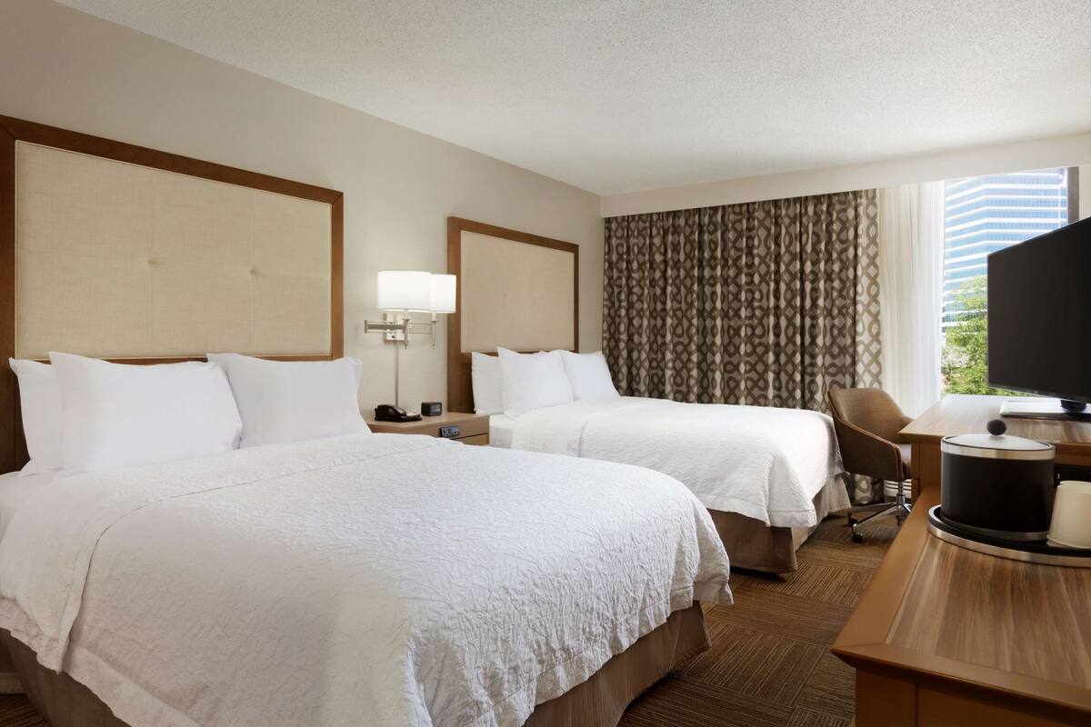 room, 2 queen beds, non smoking | in-room safe, laptop workspace, iron/ironing board, free wifi