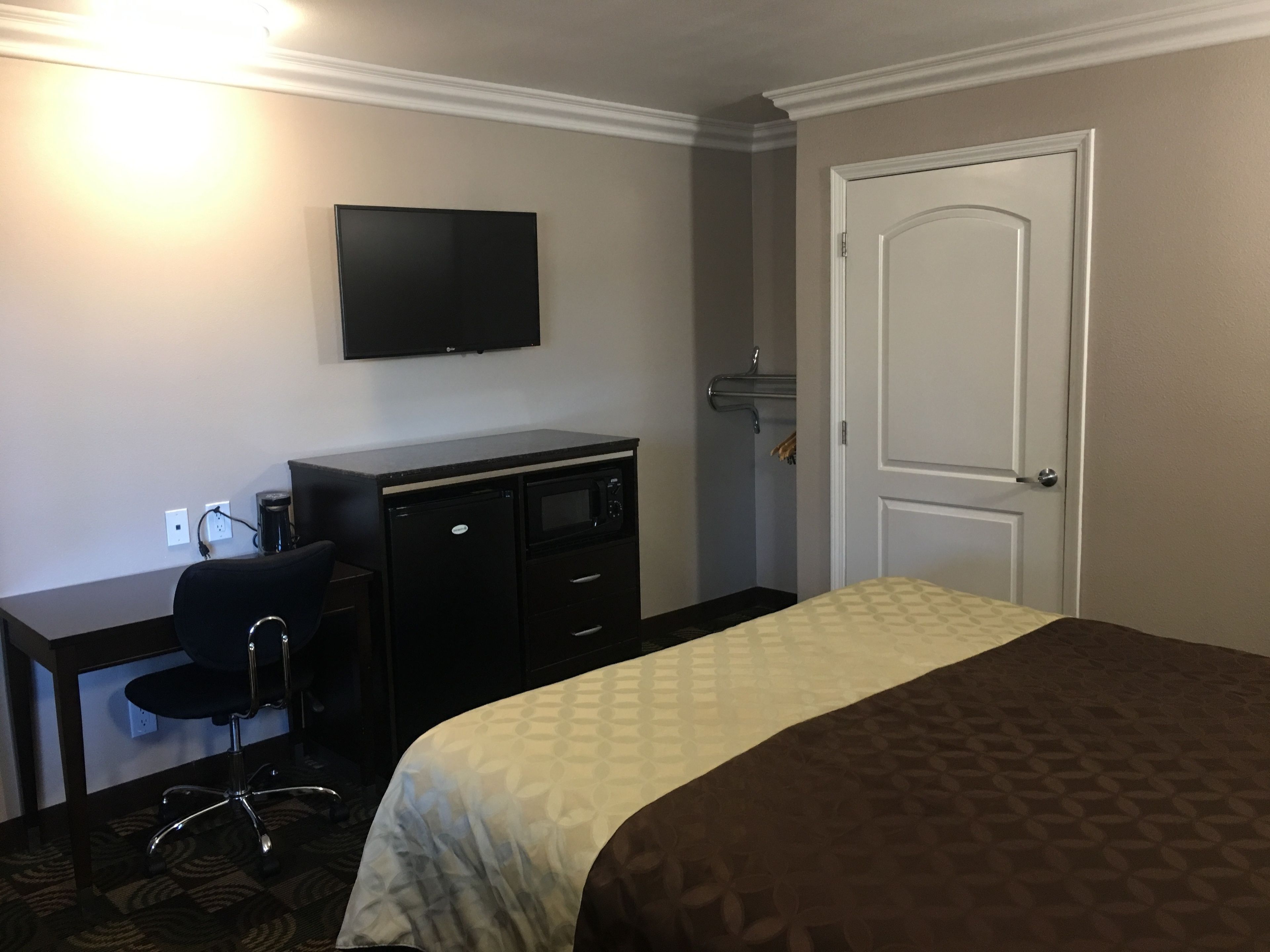 king room - disability access | premium bedding, desk, blackout curtains, iron/ironing board