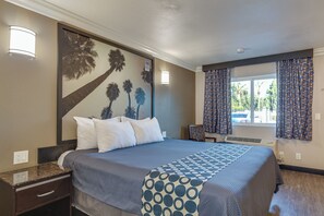 Premium bedding, desk, blackout curtains, iron/ironing board