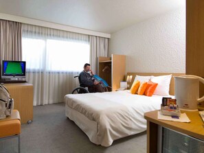 Premium bedding, memory-foam beds, minibar, in-room safe