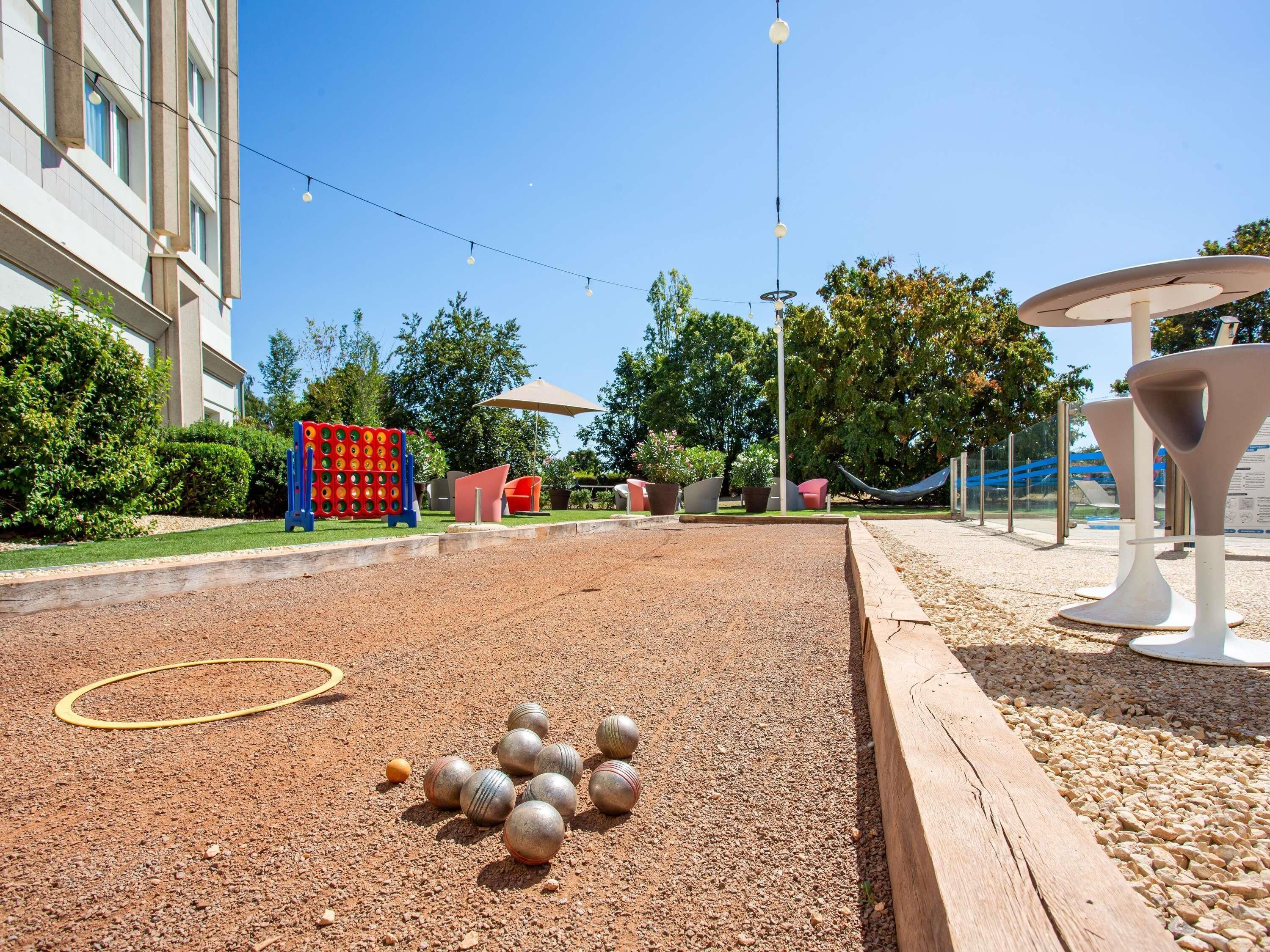 Seasonal outdoor pool, open 8:00 AM to 9:00 PM, pool umbrellas