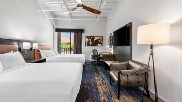 Hypo-allergenic bedding, desk, laptop workspace, blackout drapes