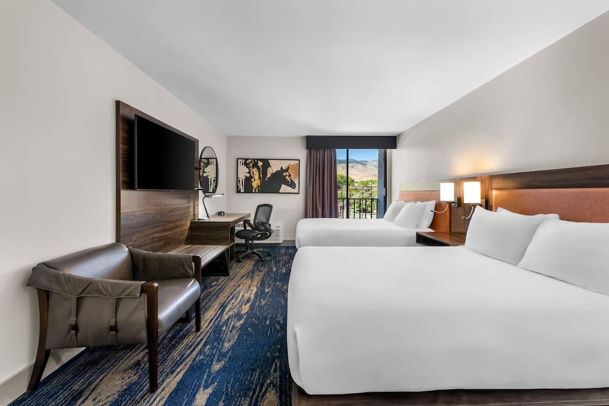 Hypo-allergenic bedding, desk, laptop workspace, blackout curtains