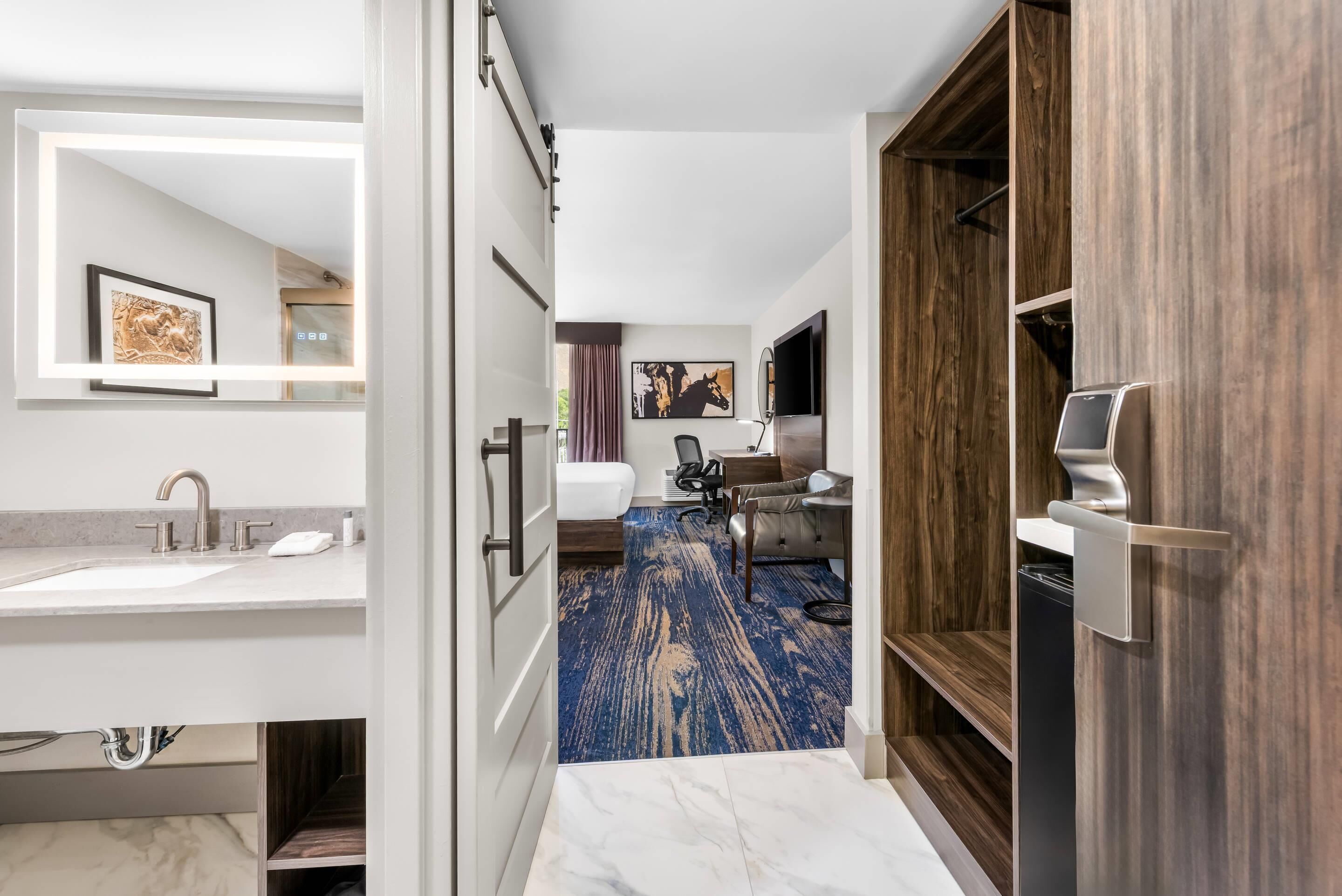 Hypo-allergenic bedding, desk, blackout drapes, iron/ironing board