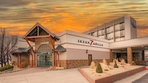 A hotel with a modern design, featuring a prominent entrance, a name sign, and a well-maintained outdoor area. - The Federal Hotel Downtown Carson City, an Ascend Collection Hotel (Carson City)