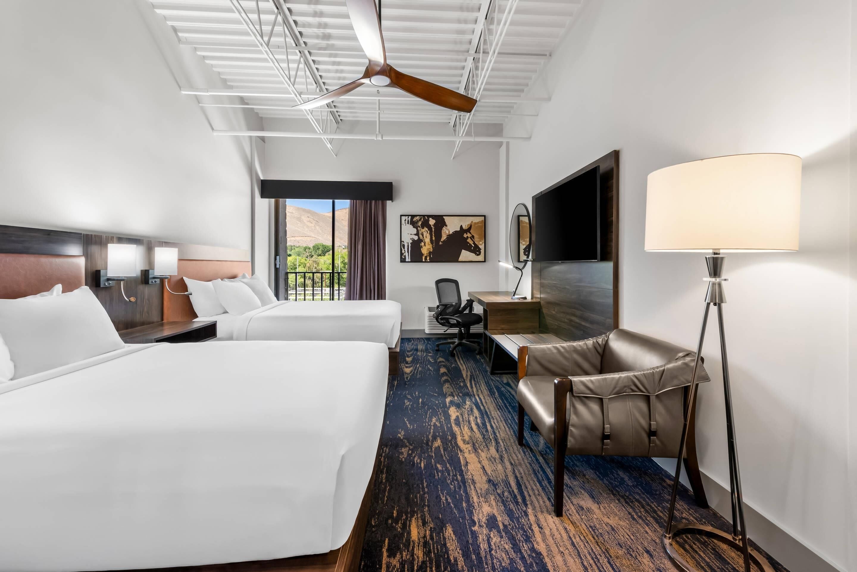 Hypo-allergenic bedding, desk, laptop workspace, blackout curtains