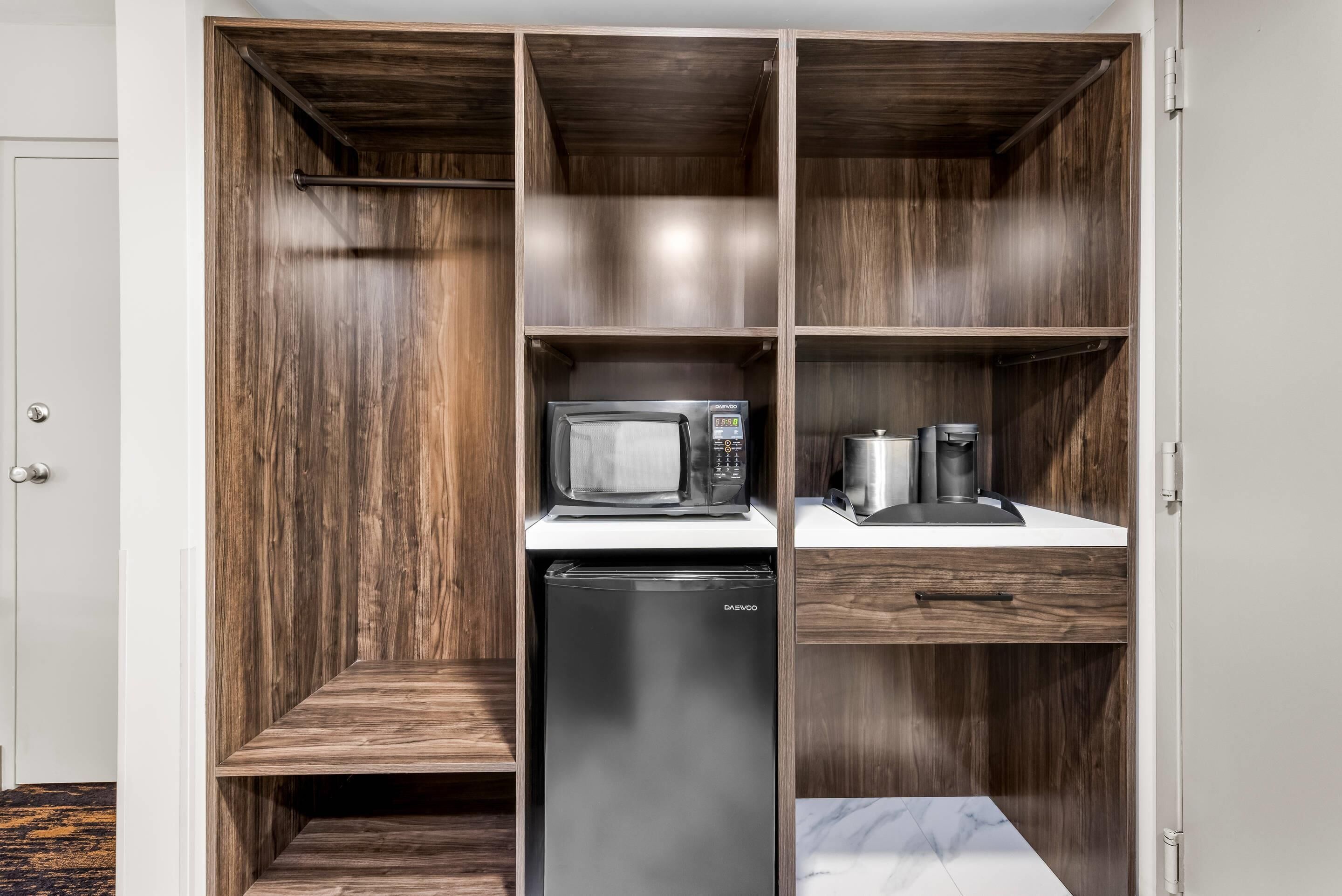 Hypo-allergenic bedding, desk, laptop workspace, blackout curtains