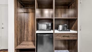 Hypo-allergenic bedding, desk, laptop workspace, blackout curtains