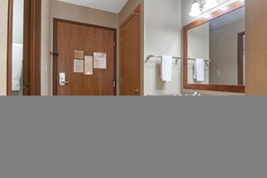 Suite, 1 King Bed with Sofa bed, Non Smoking | Bathroom | Combined shower/bathtub, free toiletries, hair dryer, towels