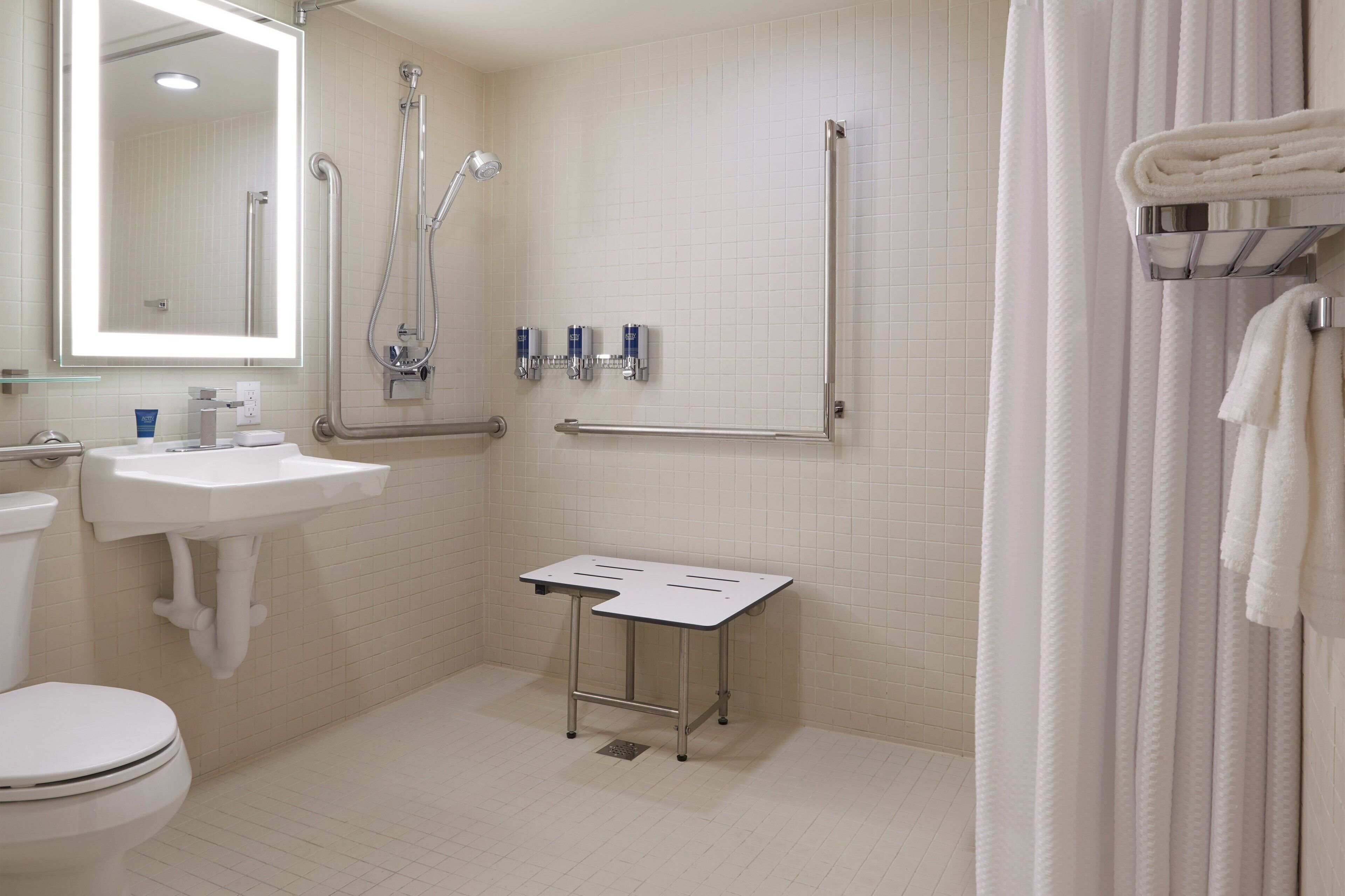 room, 1 queen bed, non smoking, city view | bathroom | combined shower/bathtub, eco-friendly toiletries, hair dryer, towels
