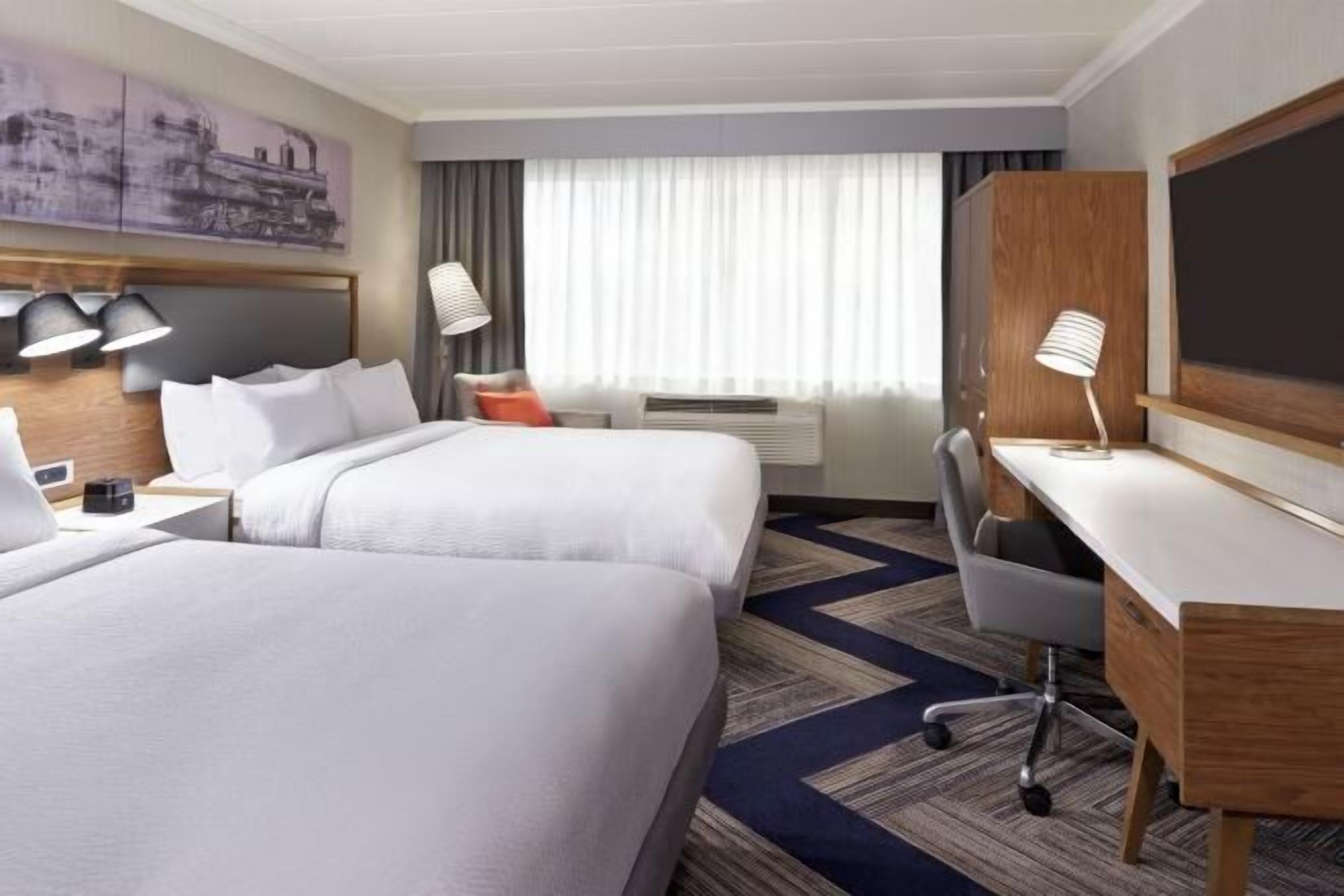 Premium bedding, desk, blackout drapes, iron/ironing board