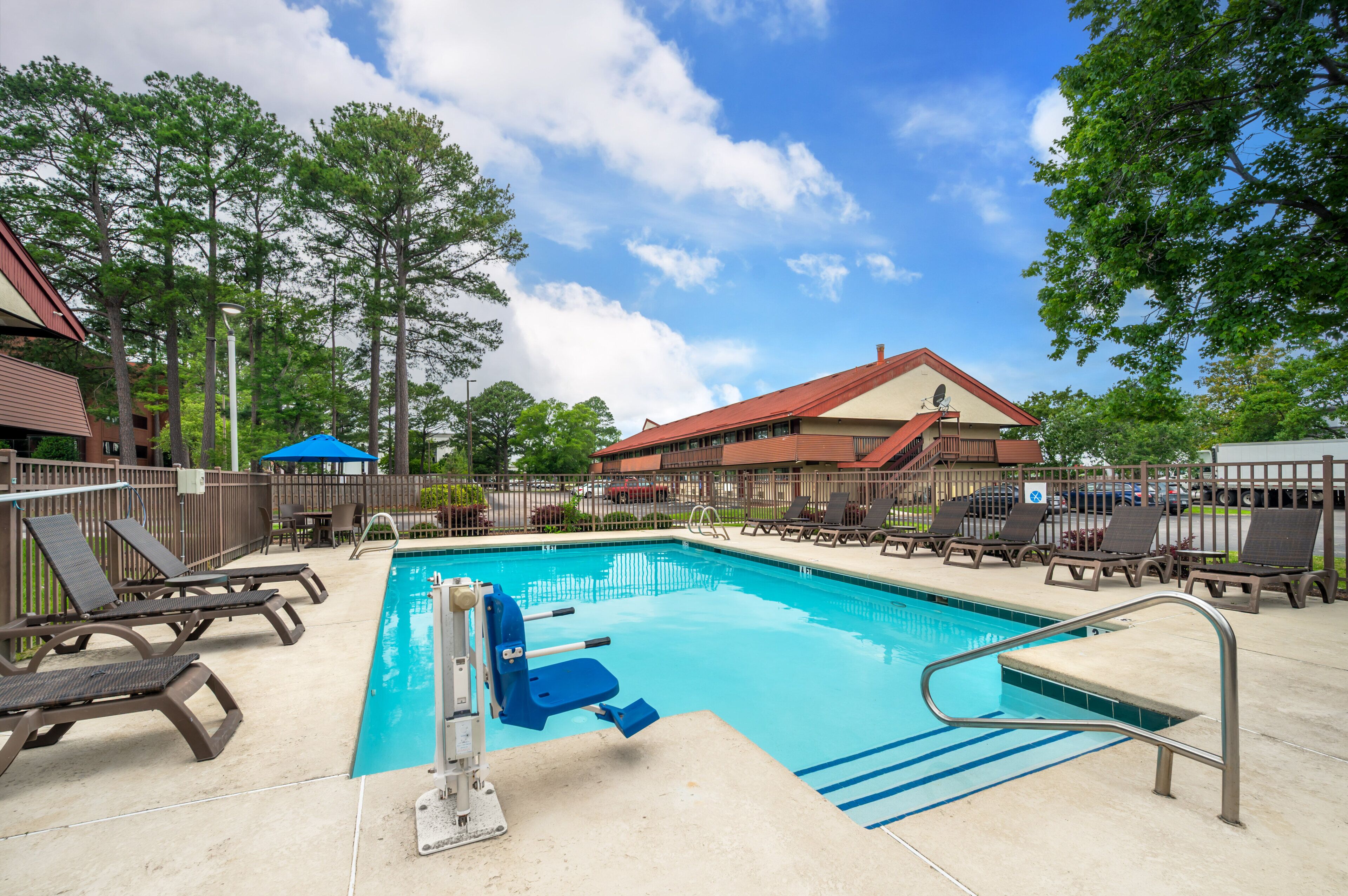 Seasonal outdoor pool, pool umbrellas, pool loungers