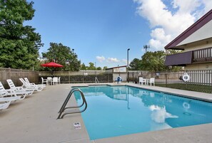 Seasonal outdoor pool, pool umbrellas, pool loungers