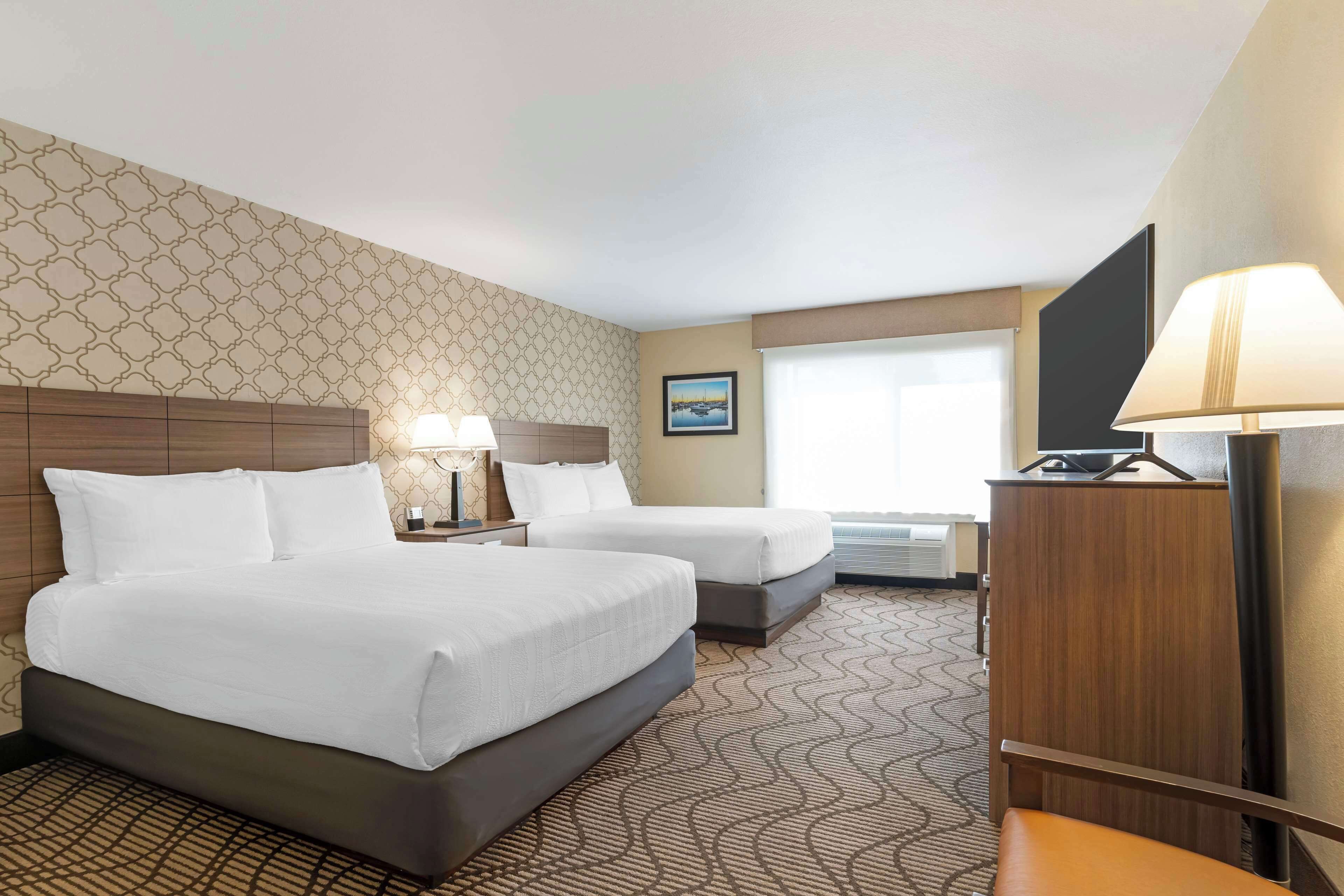 premium bedding, desk, blackout curtains, iron/ironing board