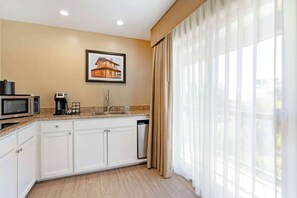 Suite, 1 King Bed, Non Smoking, Balcony | Private kitchenette | Mini-fridge, microwave, coffee/tea maker