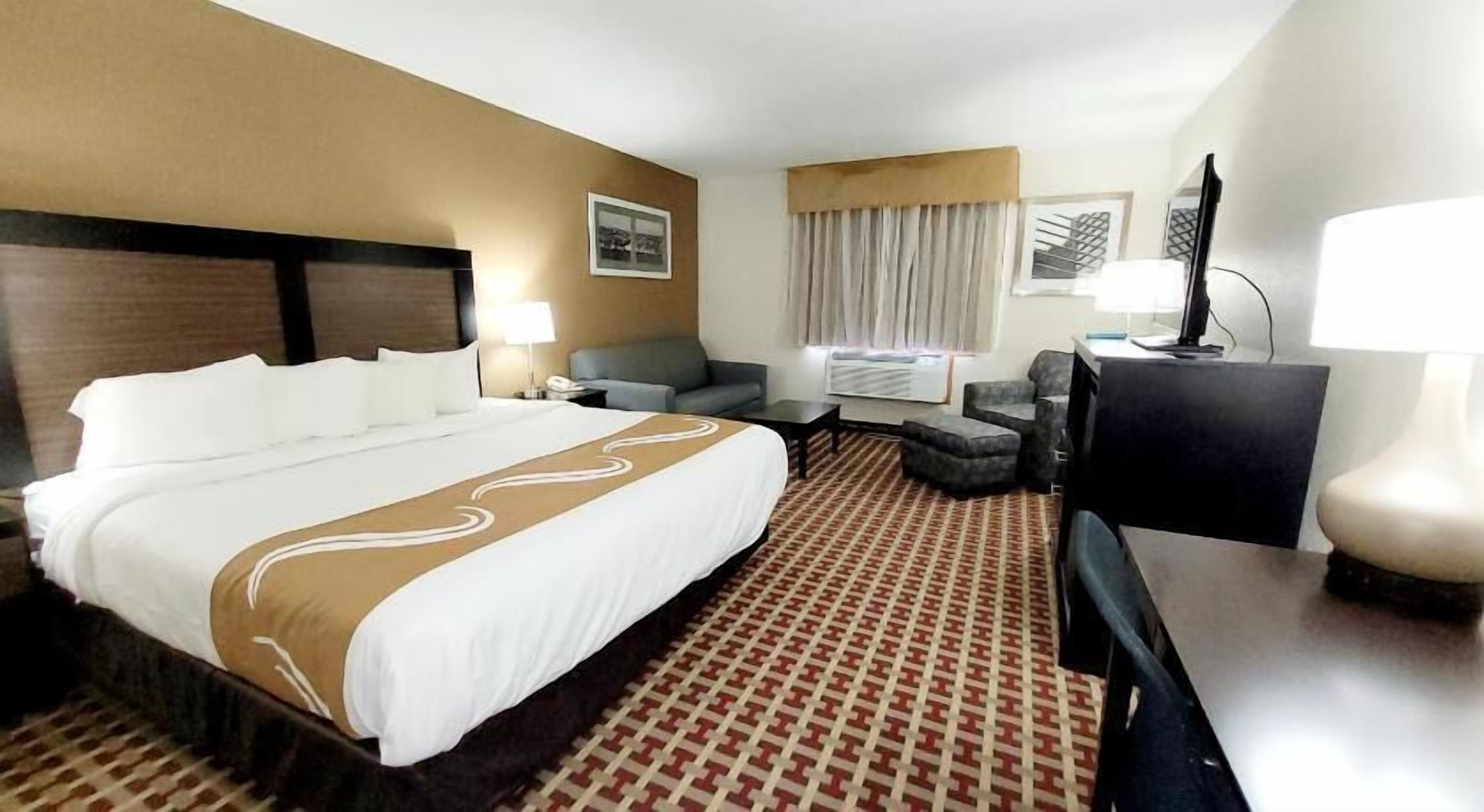 Premium bedding, blackout drapes, soundproofing, iron/ironing board