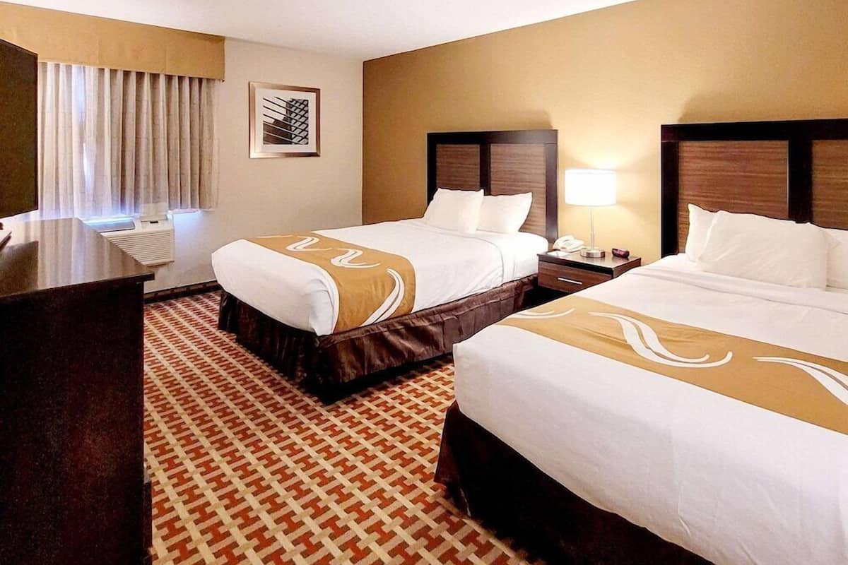 Premium bedding, blackout drapes, soundproofing, iron/ironing board