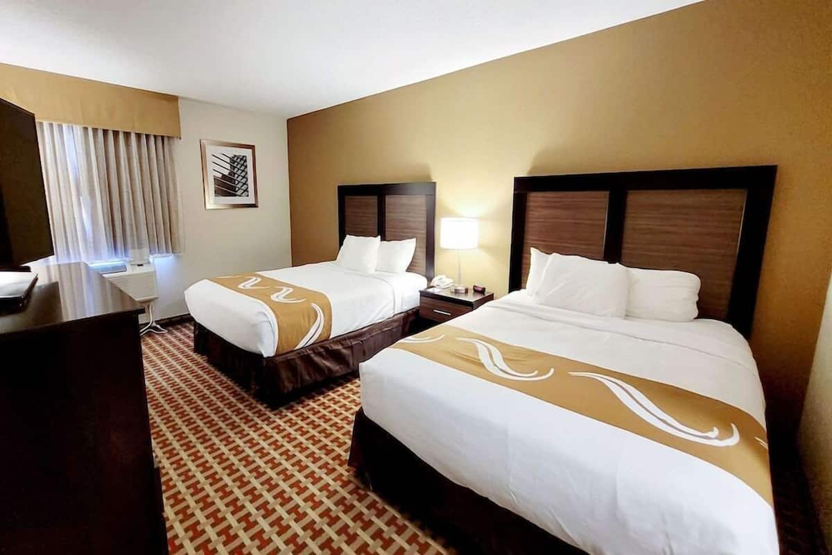 Premium bedding, blackout drapes, soundproofing, iron/ironing board