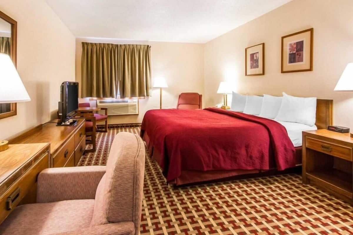 Premium bedding, blackout drapes, soundproofing, iron/ironing board