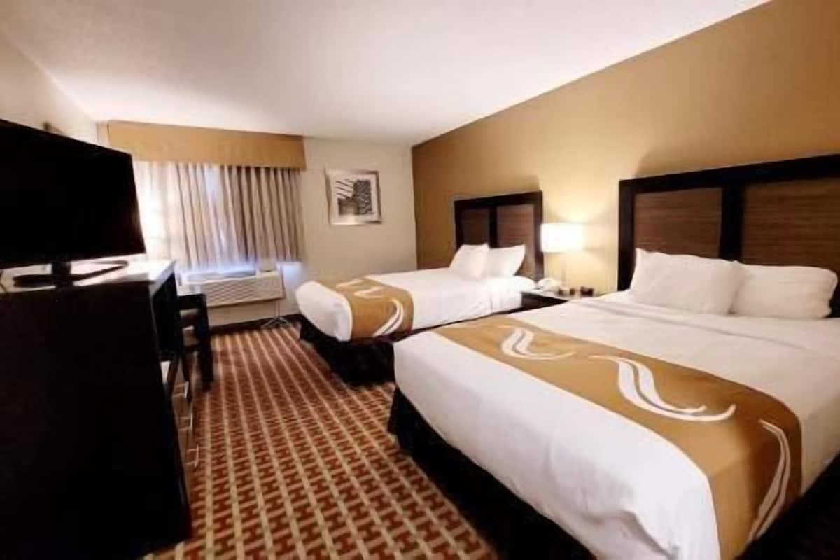 Premium bedding, blackout drapes, soundproofing, iron/ironing board