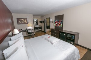 Premium Room, 1 King Bed (Upgraded Bedding & Snack, Smoke Free) | Pillowtop beds, desk, blackout drapes, free WiFi