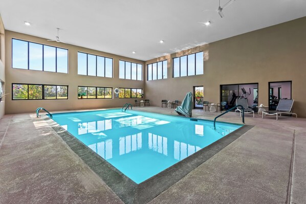 Indoor pool, open 6 AM to 11 PM, pool loungers