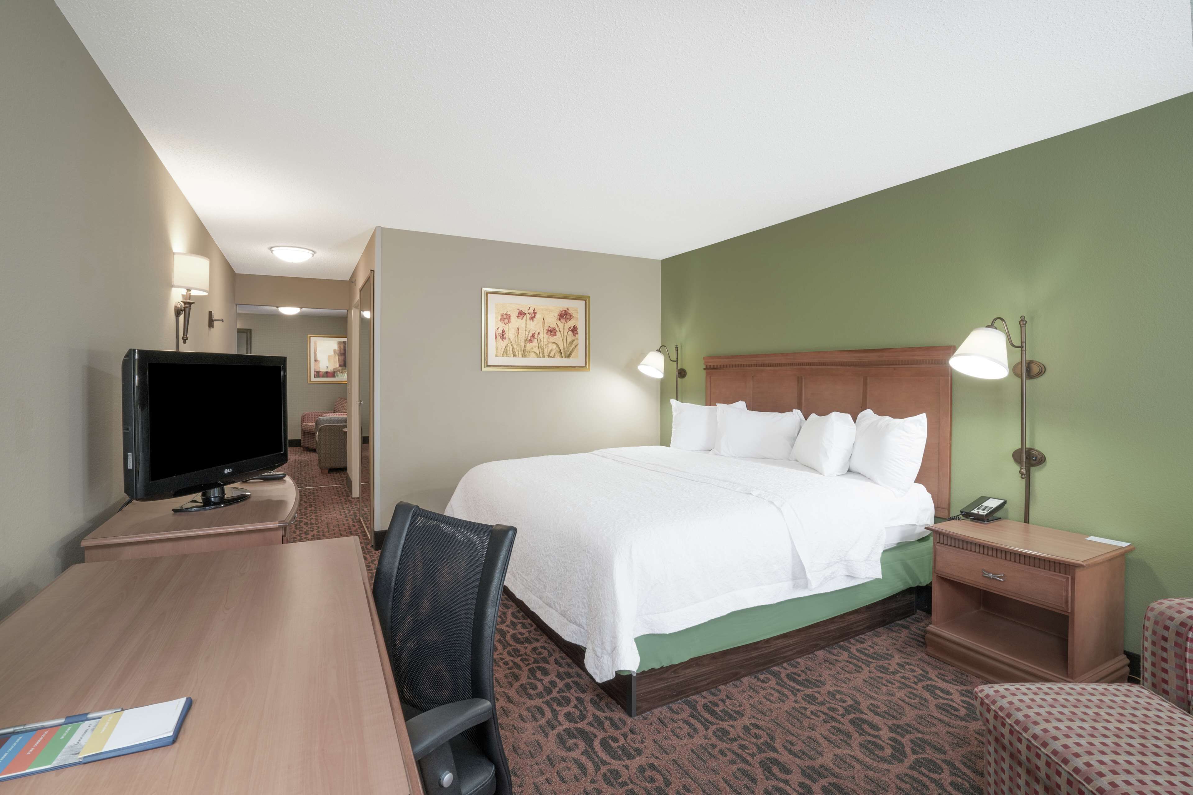 suite, 1 king bed, non smoking | in-room safe, iron/ironing board, free cots/infant beds, rollaway beds