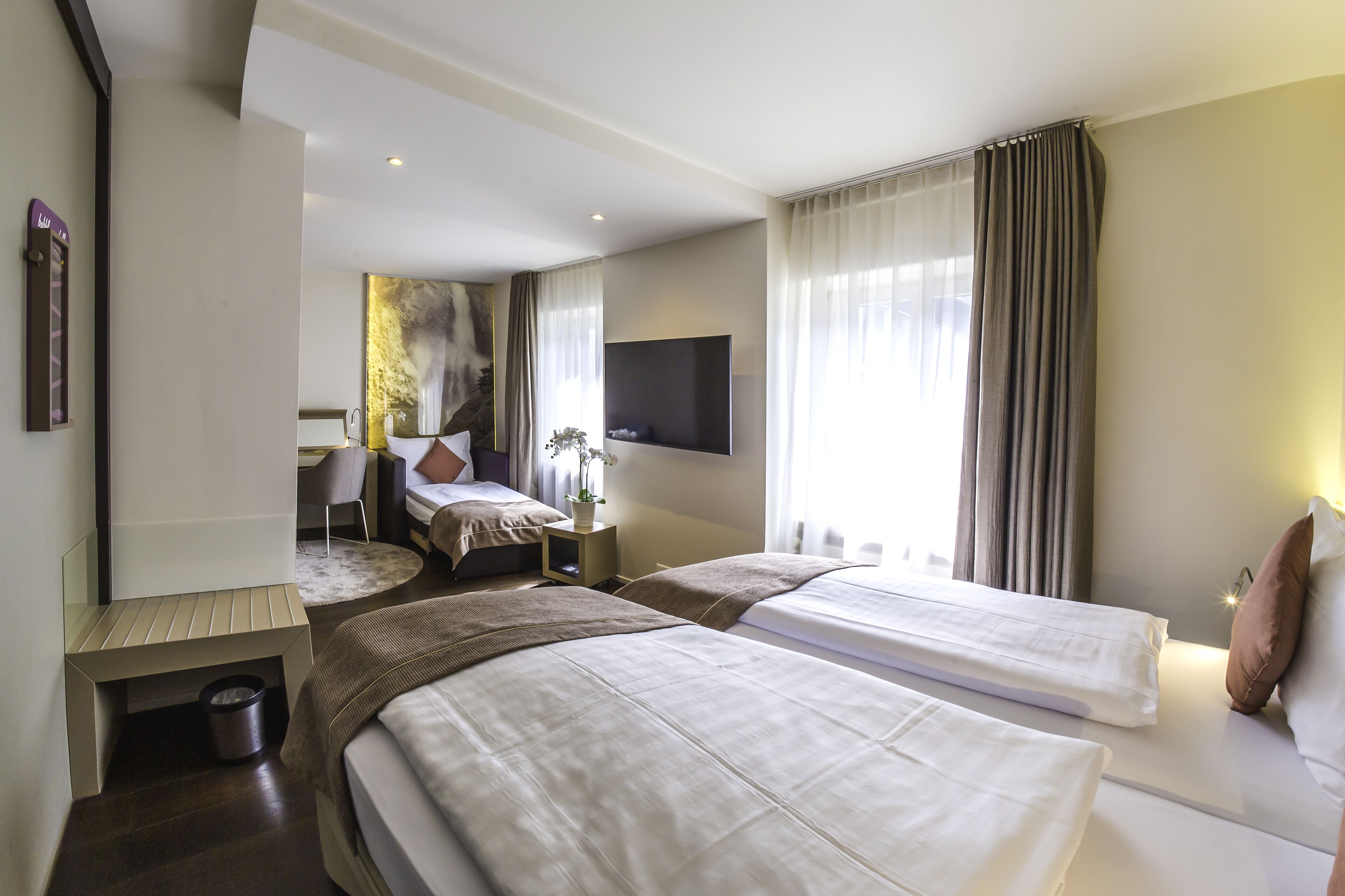 family room small | hypo-allergenic bedding, free minibar, in-room safe