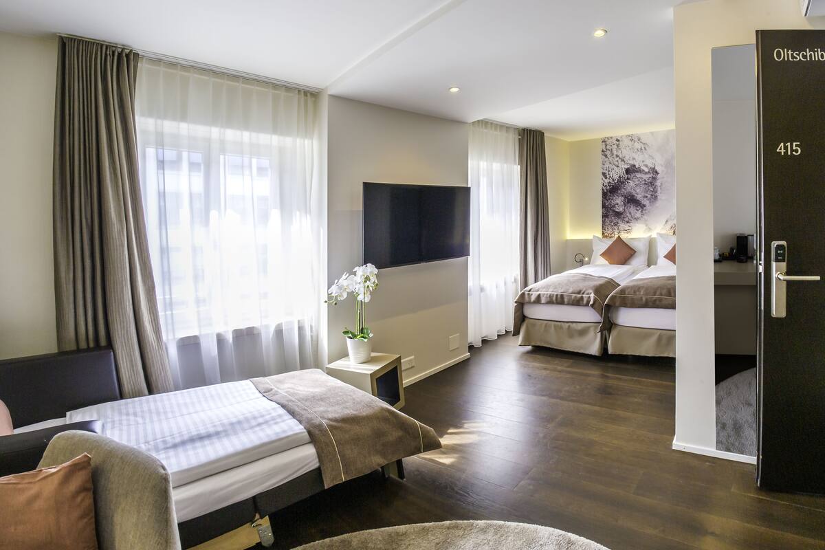 family room small | hypo-allergenic bedding, free minibar, in-room safe