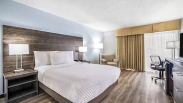 Ropa de cama de alta calidad y caja de seguridad en la habitación