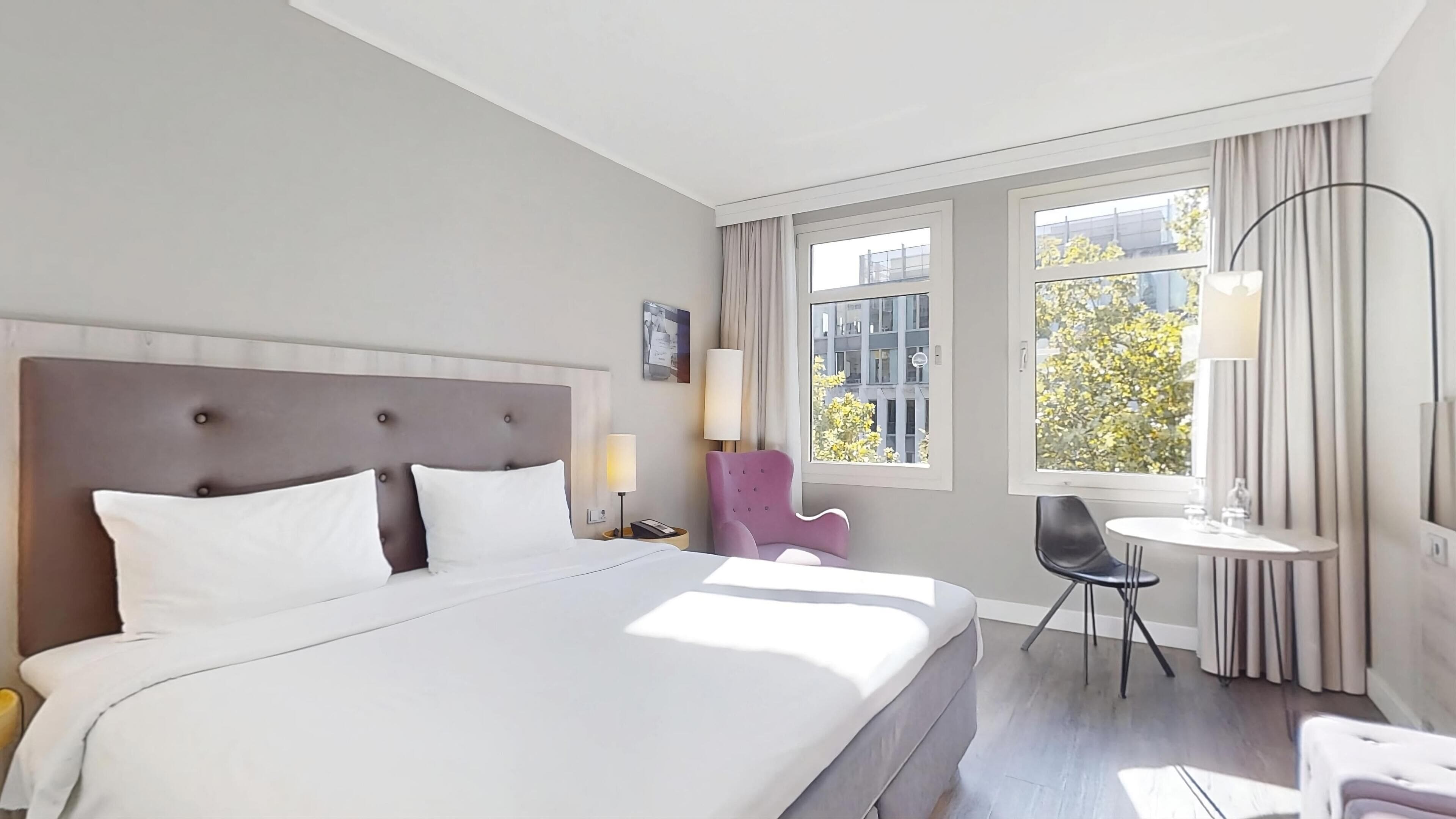 Superior Room | Hypo-allergenic bedding, down duvets, in-room safe, desk