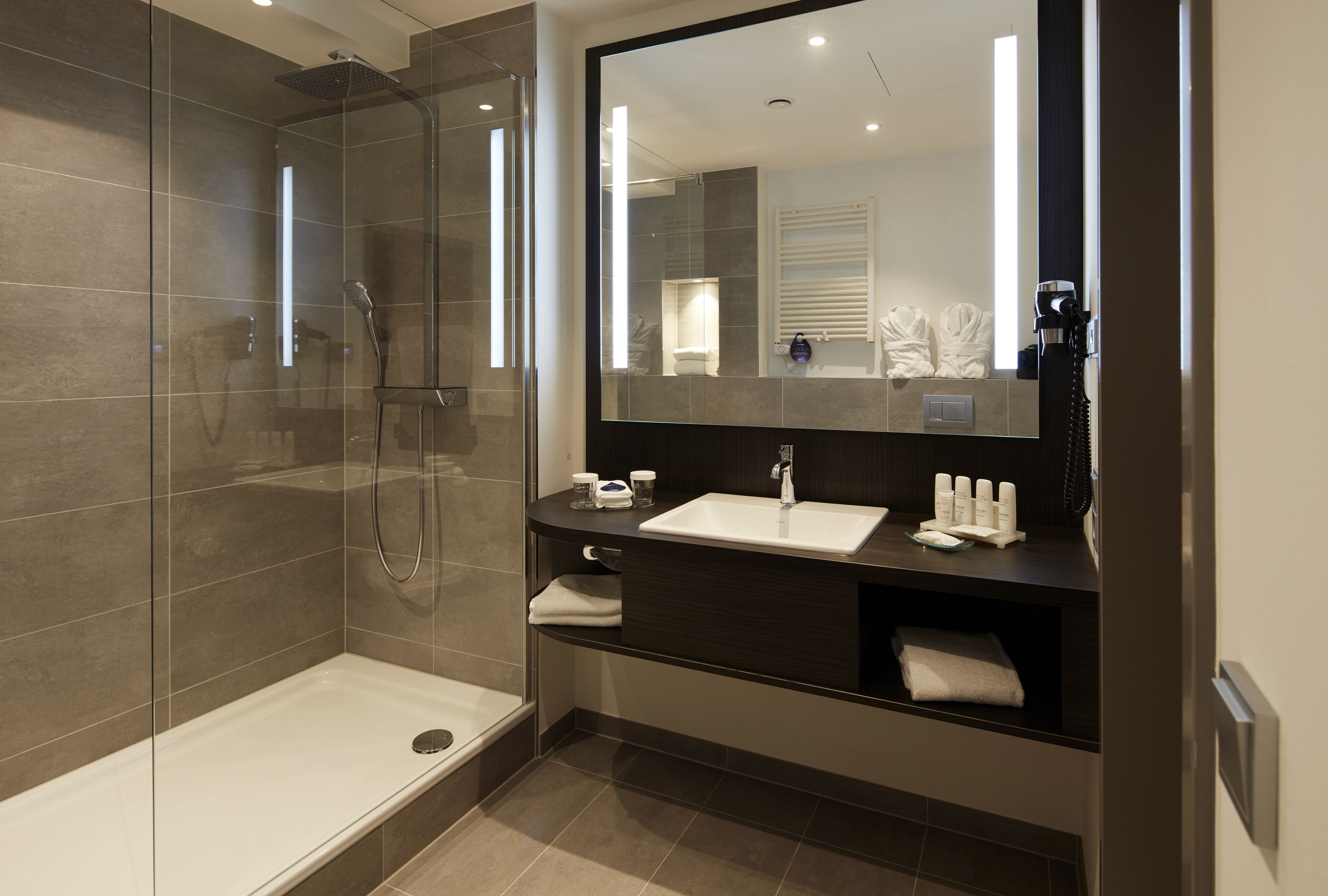 Shower, rainfall showerhead, eco-friendly toiletries, hair dryer