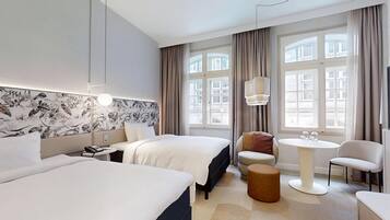 Hypo-allergenic bedding, down comforters, in-room safe, desk