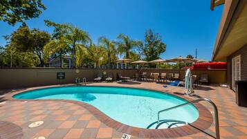 Outdoor pool, open 7:00 AM to 10:00 PM, pool umbrellas, sun loungers