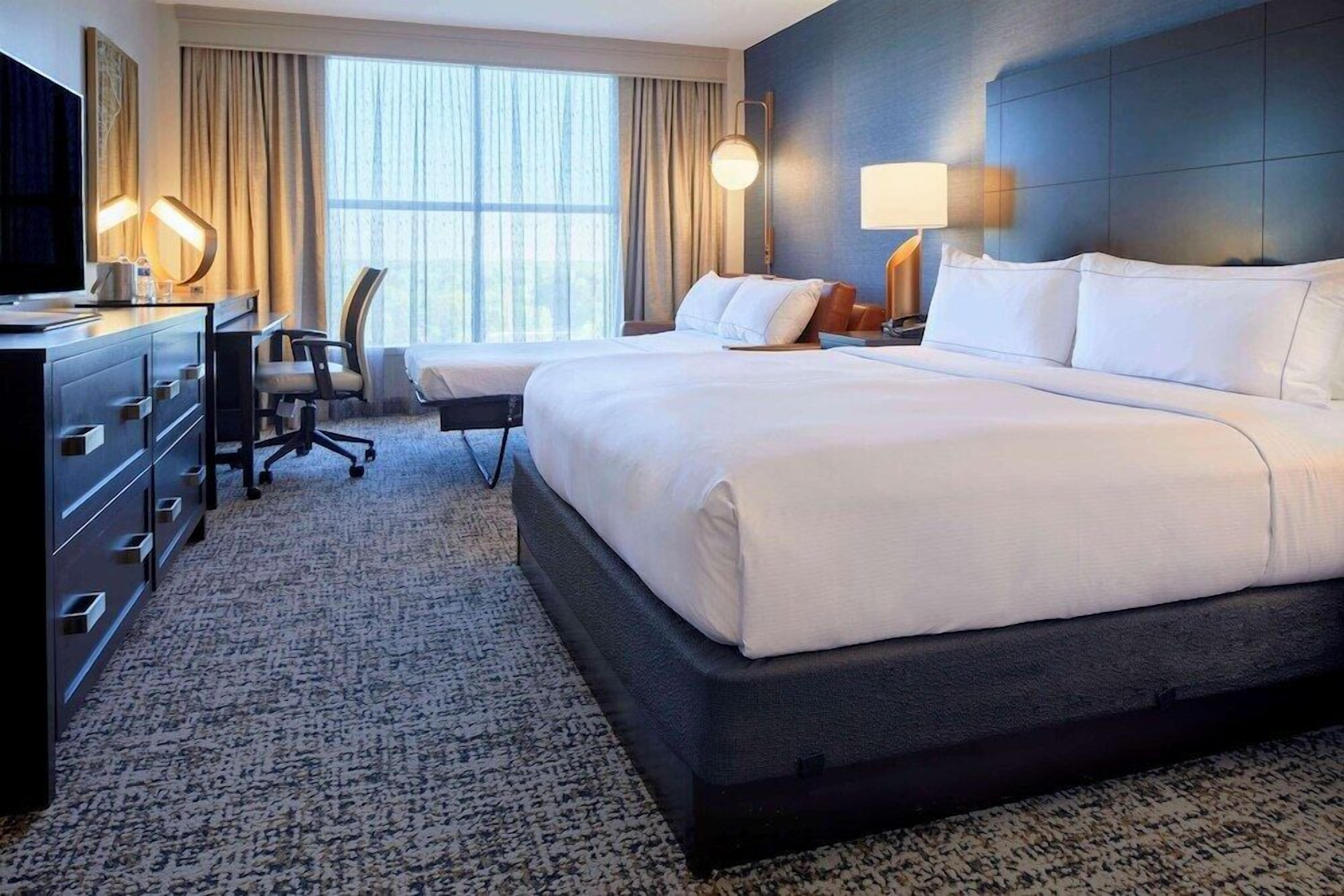 Premium bedding, down duvets, in-room safe, desk
