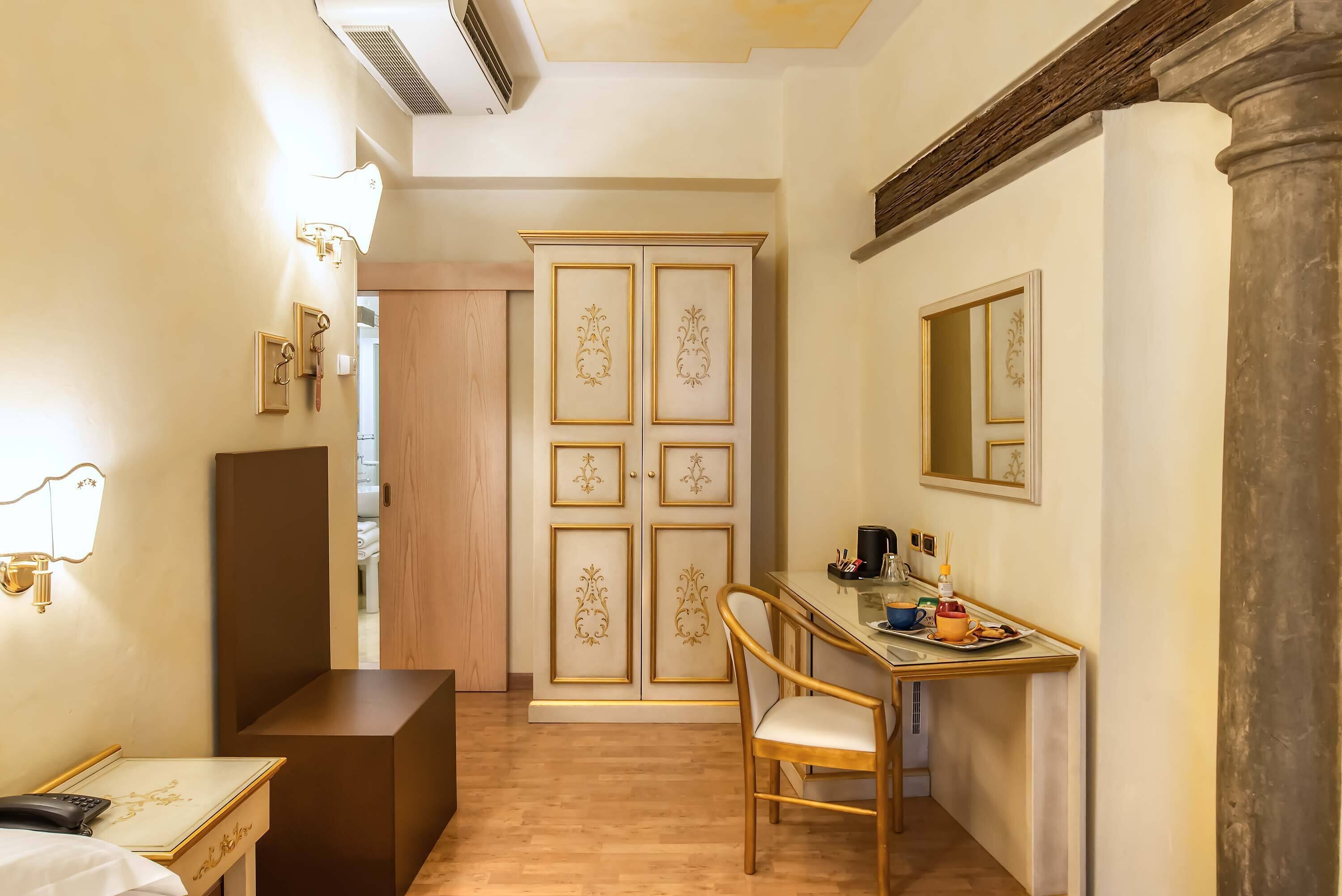 standard double or twin room | living area | tv, video game console, dvd player