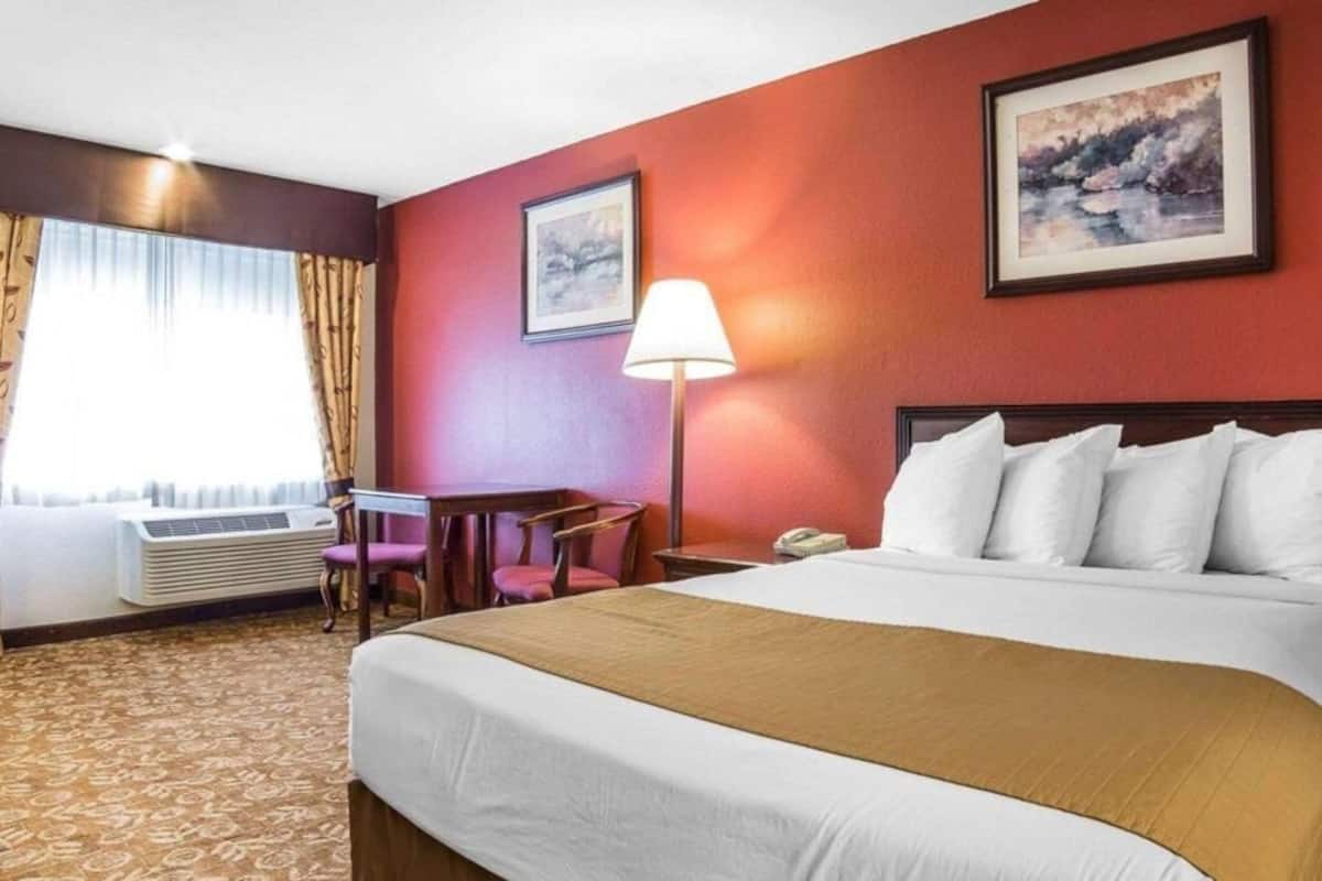 Pillowtop beds, desk, blackout drapes, iron/ironing board