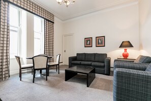 Apartment, 3 Bedrooms | Living room | TV