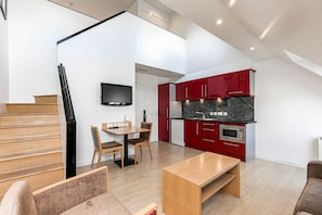 Apartment, 1 Bedroom | Living area | TV