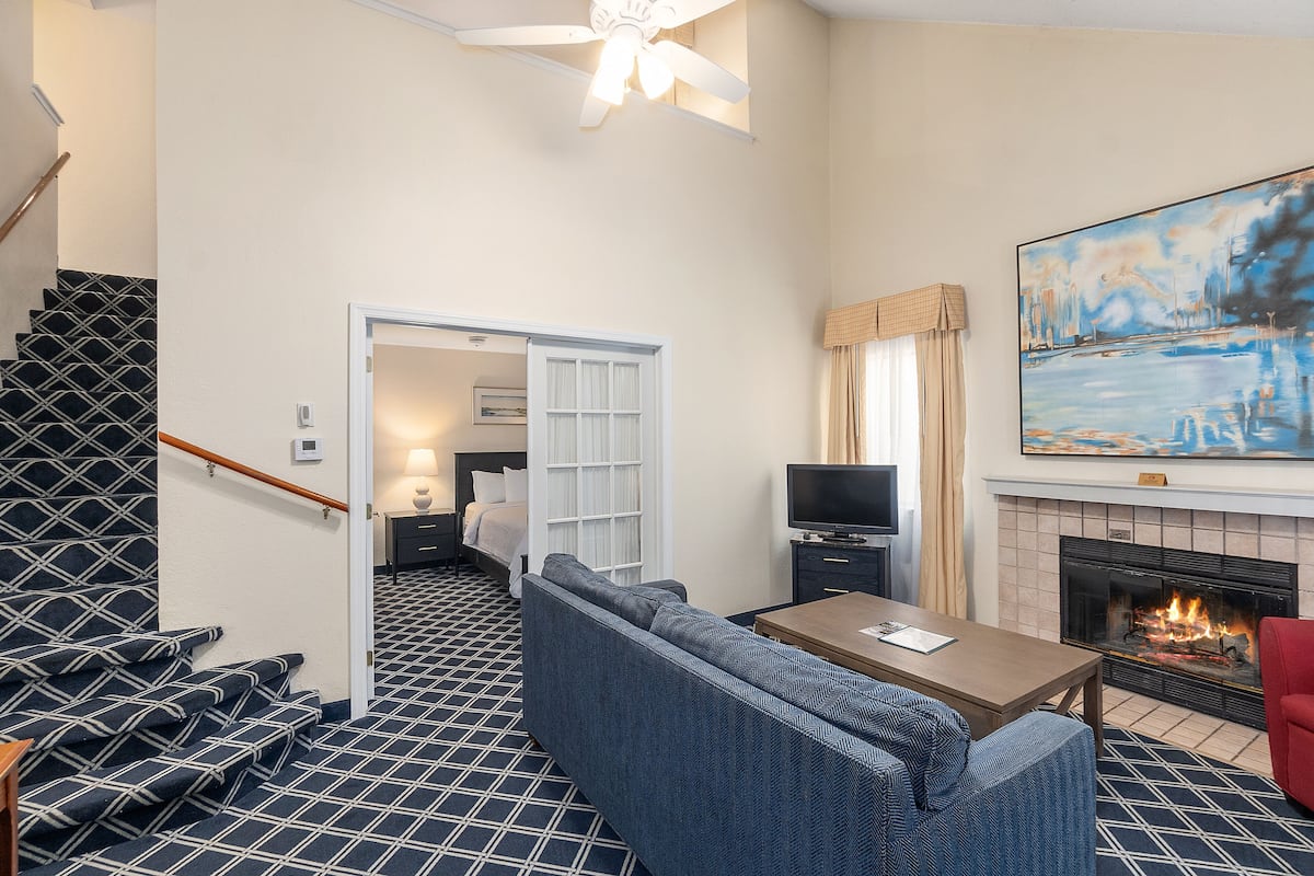 Luxury Loft, 2 Bedrooms | Living area | 32-inch flat-screen TV with cable channels, TV, iPod dock