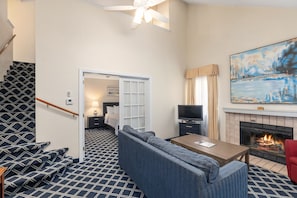 Luxury Loft, 2 Bedrooms | Living area | 32-inch flat-screen TV with cable channels, TV, iPod dock