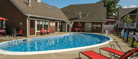 Seasonal outdoor pool, open 8:00 AM to 8:00 PM, pool umbrellas