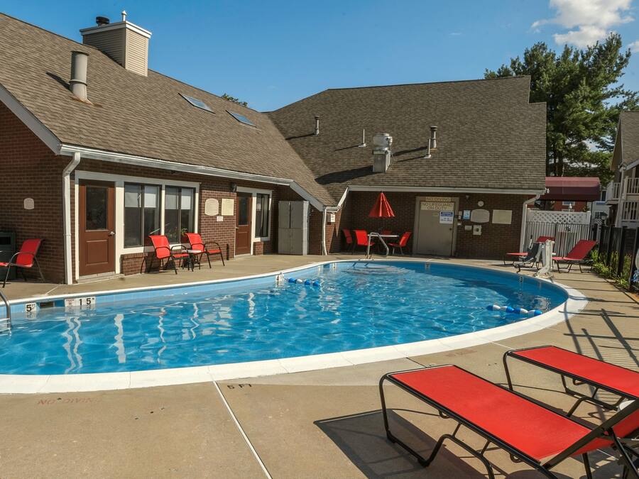 Seasonal outdoor pool, open 8:00 AM to 8:00 PM, pool umbrellas