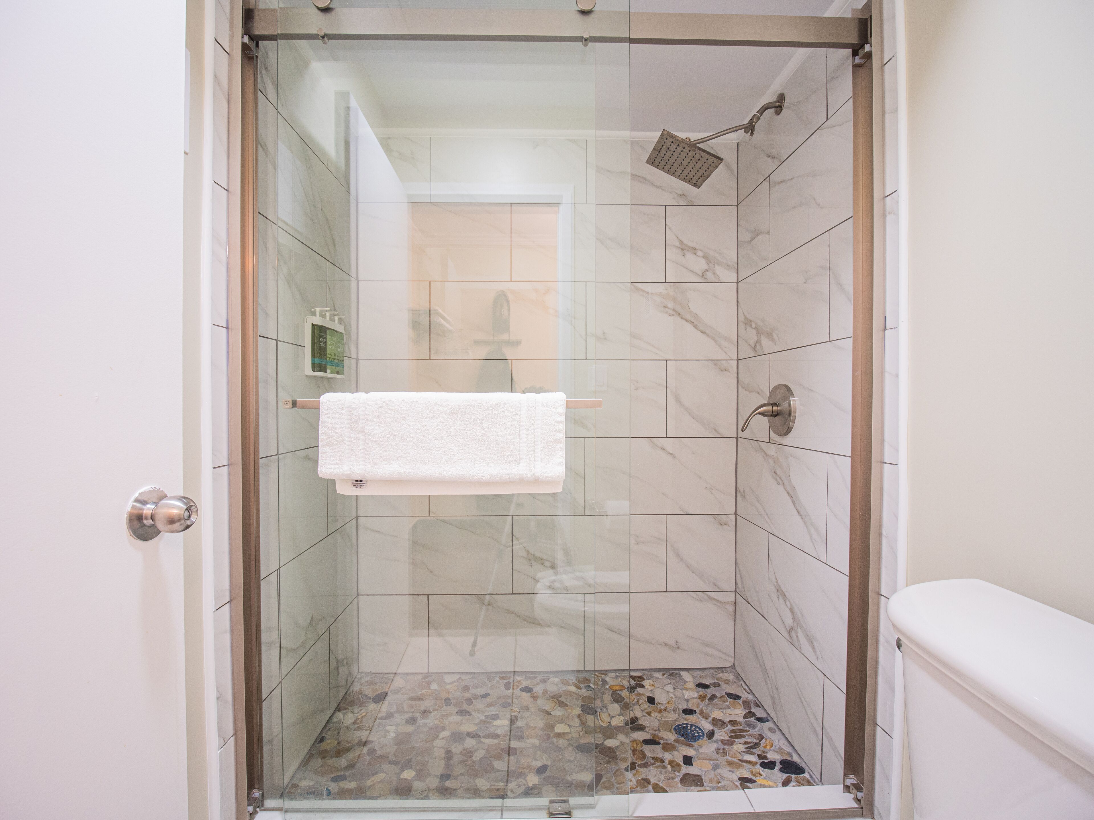 junior room, 1 king bed | bathroom | designer toiletries, hair dryer, towels, soap