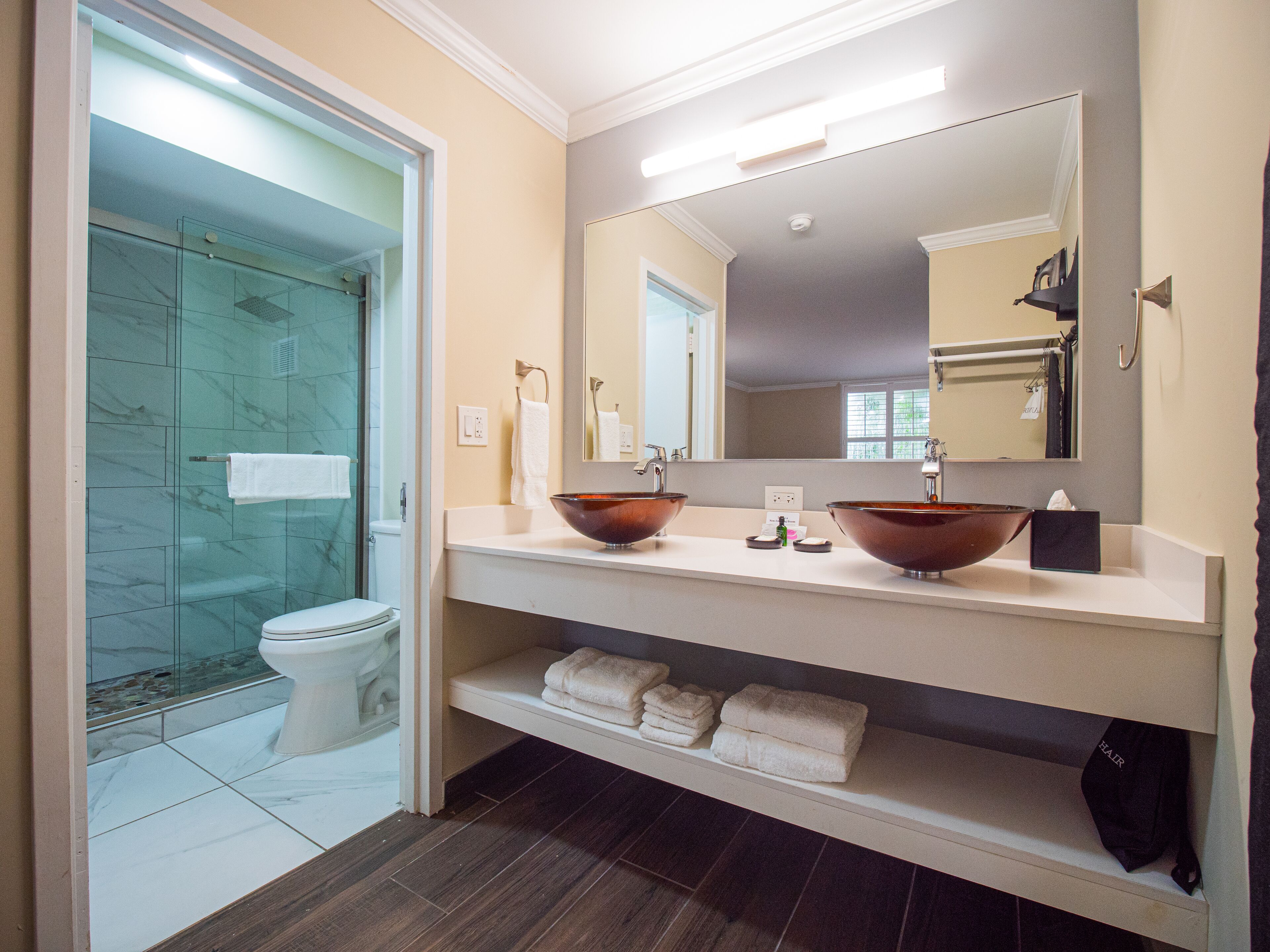 standard room, 2 queen beds | bathroom | designer toiletries, hair dryer, towels, soap