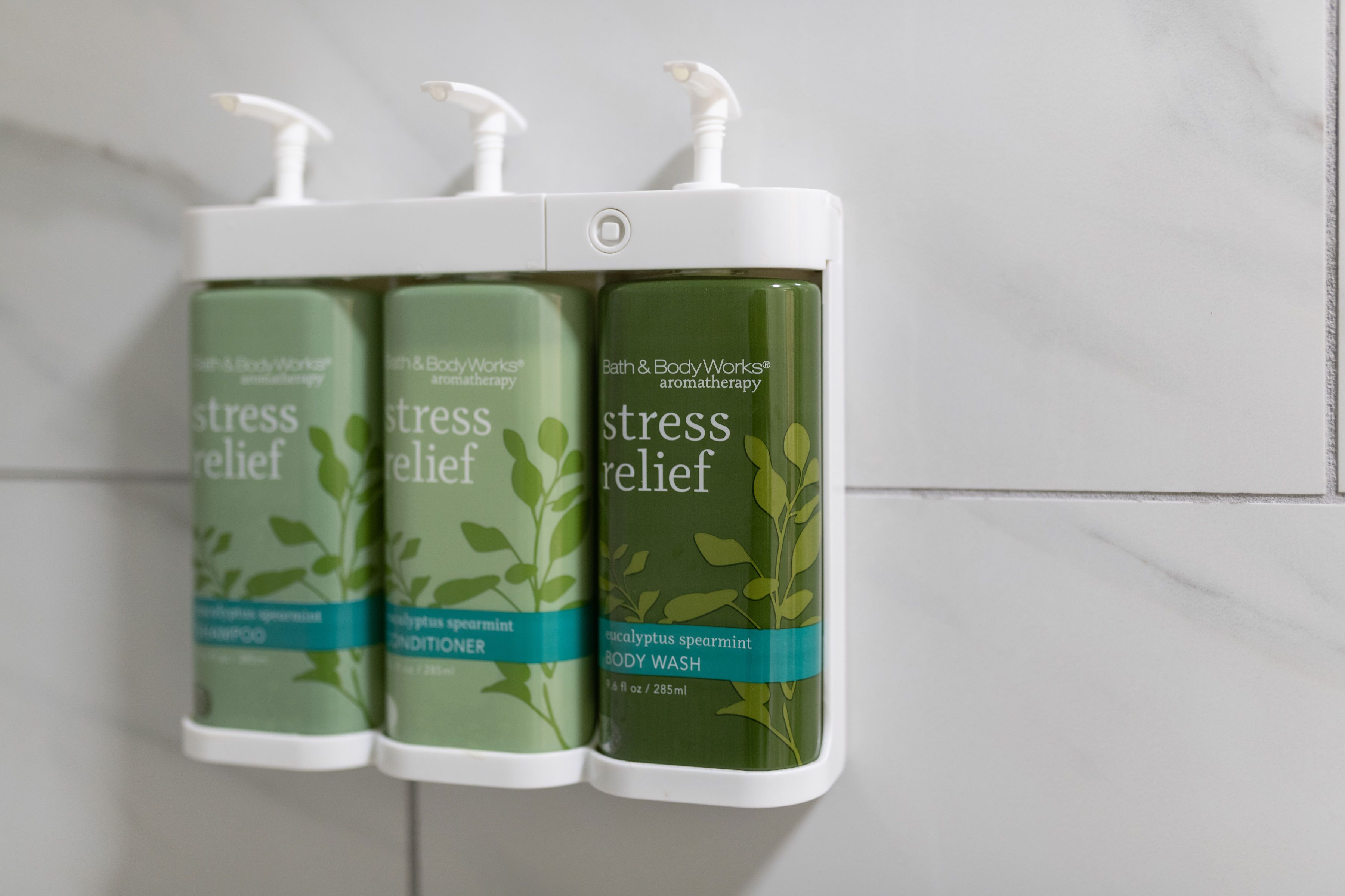 designer toiletries, hair dryer, towels, soap