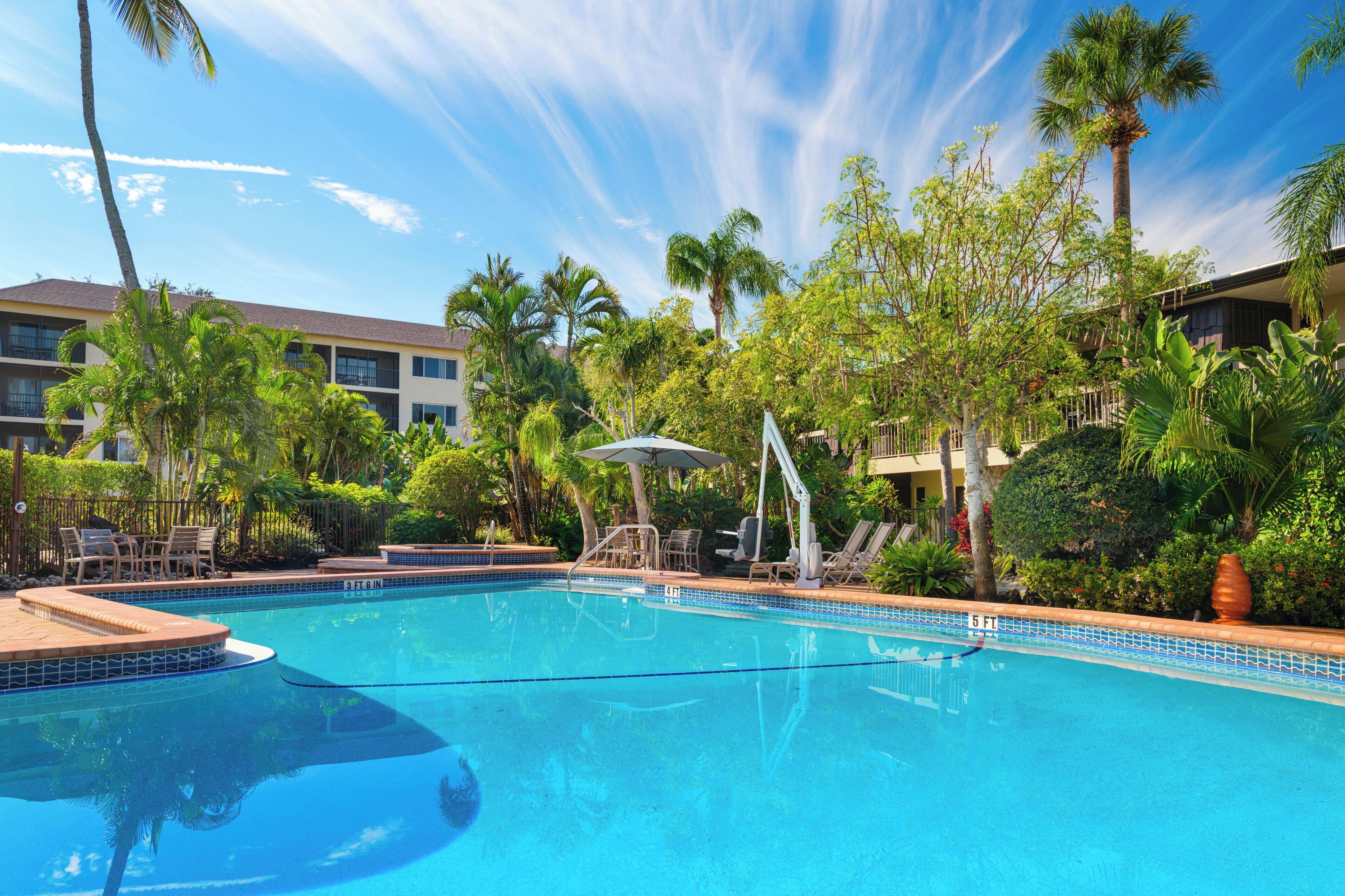 2 outdoor pools, a heated pool, pool umbrellas, pool loungers