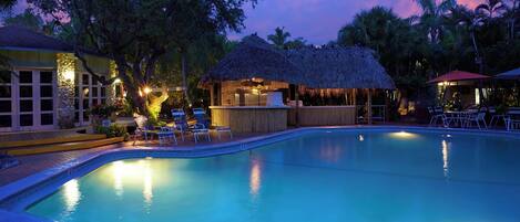 2 outdoor pools, a heated pool, pool umbrellas, pool loungers