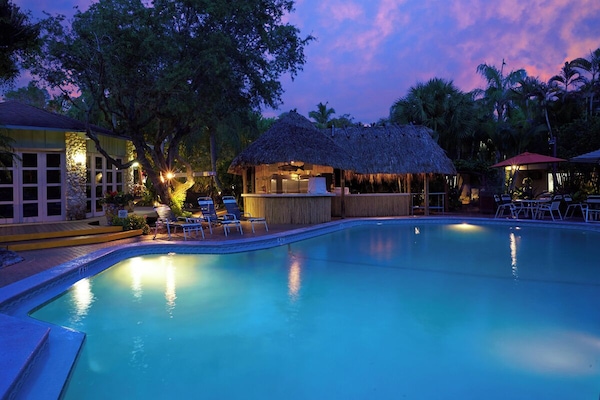 2 outdoor pools, a heated pool, pool umbrellas, pool loungers