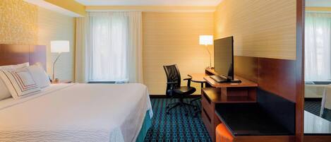 Desk, laptop workspace, blackout drapes, iron/ironing board